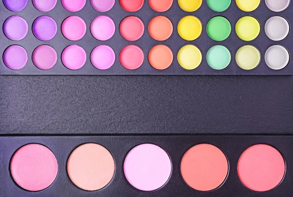 Professional multi colored blushes and eyeshadows palettes — Stock Photo, Image