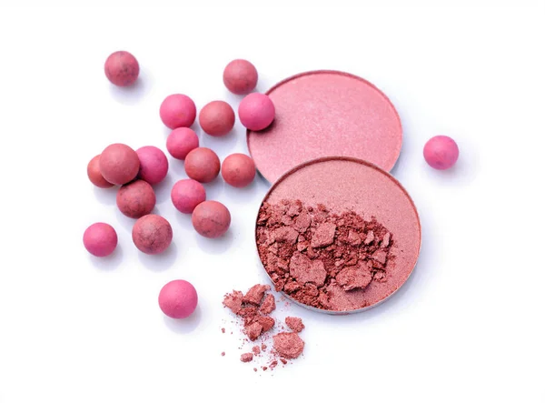 Palline di fard rosa e beige e polvere di fard — Foto Stock