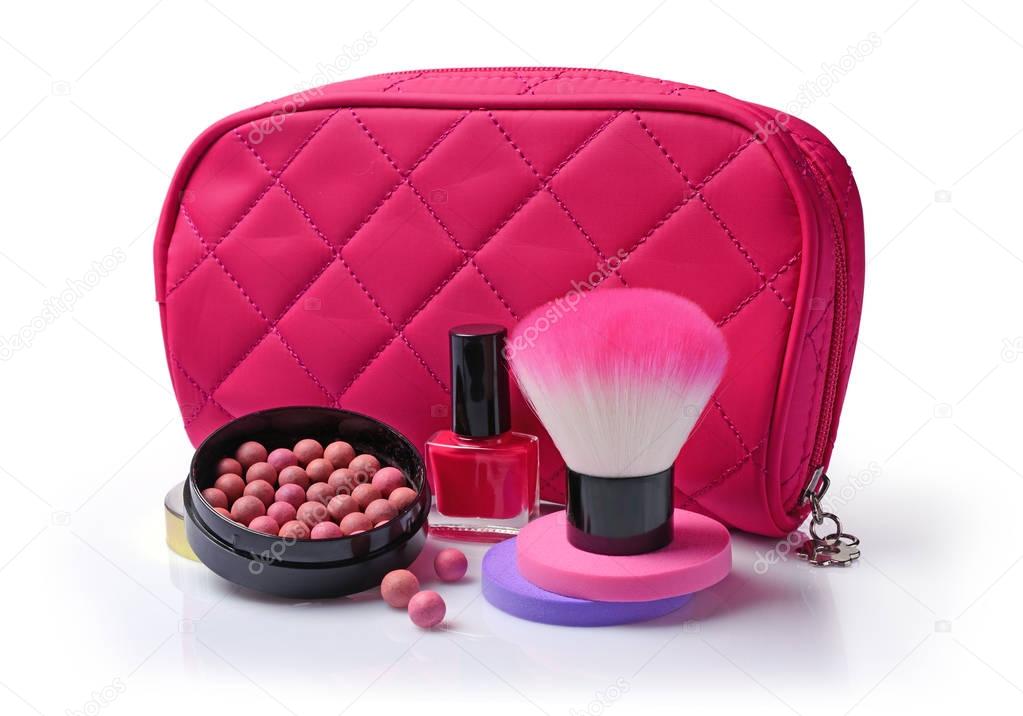 Composition of cosmetics with nail polish, ball blush, sponges, brush and cosmetic bag
