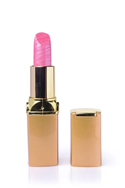 Różowa szminka w złoto koperta — Zdjęcie stockowe