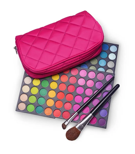 Ροζ καλλυντική τσάντα και παλέτες χρωματιστές σκιές ματιών για το μακιγιάζ πινέλα — Φωτογραφία Αρχείου