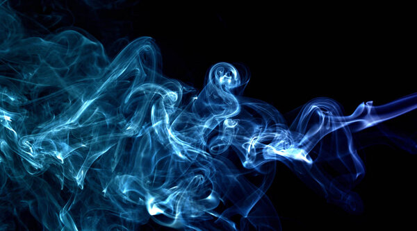 Transparented colorful cloud of smoke isolated on black background