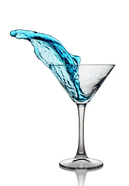 Splash in glass of a blue alcoholic cocktail drink — Stock Photo, Image