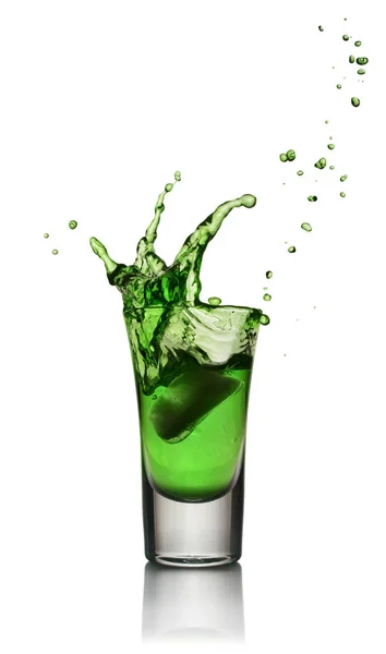 Glass of alcoholic drink with ice. Absinthe or mint liquor shot — Stock Photo, Image