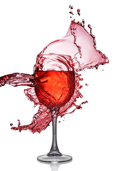 Splash of red wine in glass — Stock Photo, Image