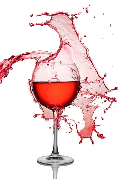 Big splash of red wine in glass — Stock Photo, Image