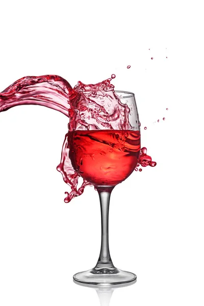 Splash de vinho tinto em vidro — Fotografia de Stock