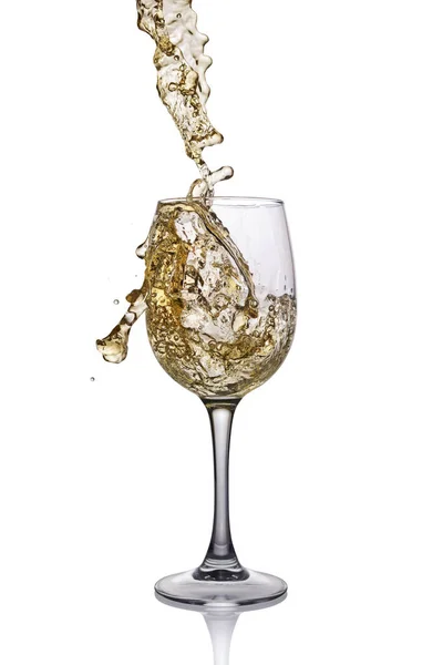 Splash of white wine in glass with reflection — Stock Photo, Image