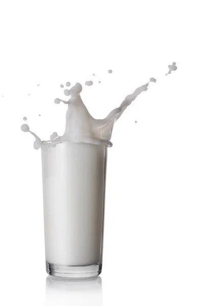 Splash in glass of white milk — Stock Photo, Image