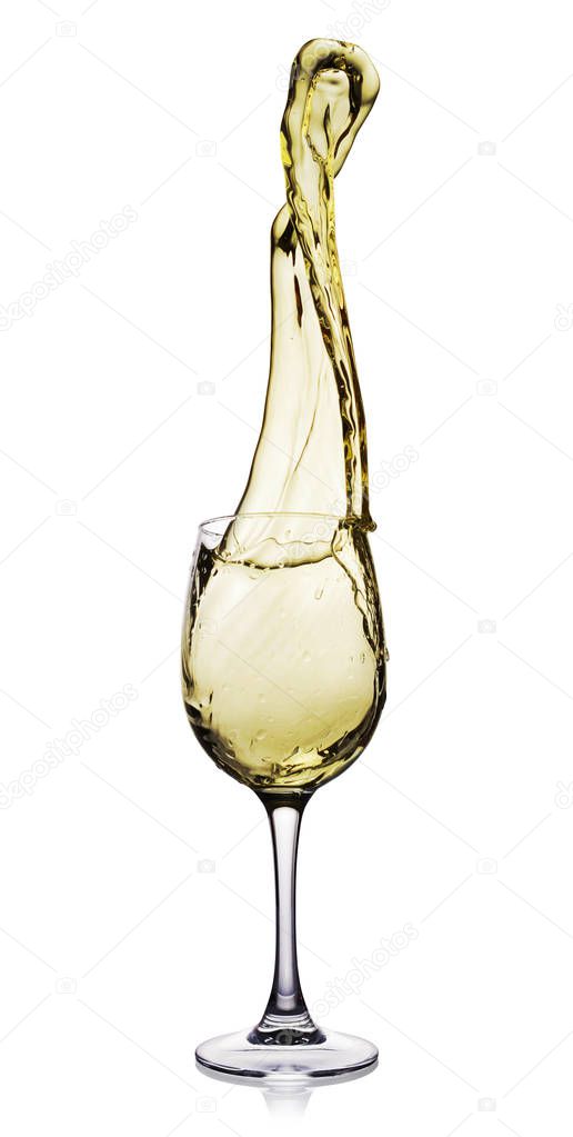 Splash of white wine in glass with reflection