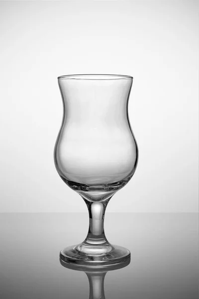 Empty hurricane glass for tropical cocktail — Stock Photo, Image