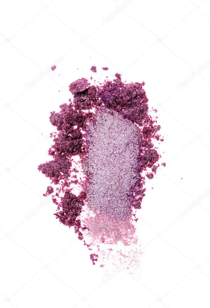 Smear of crushed violet eyeshadow as sample of cosmetic product