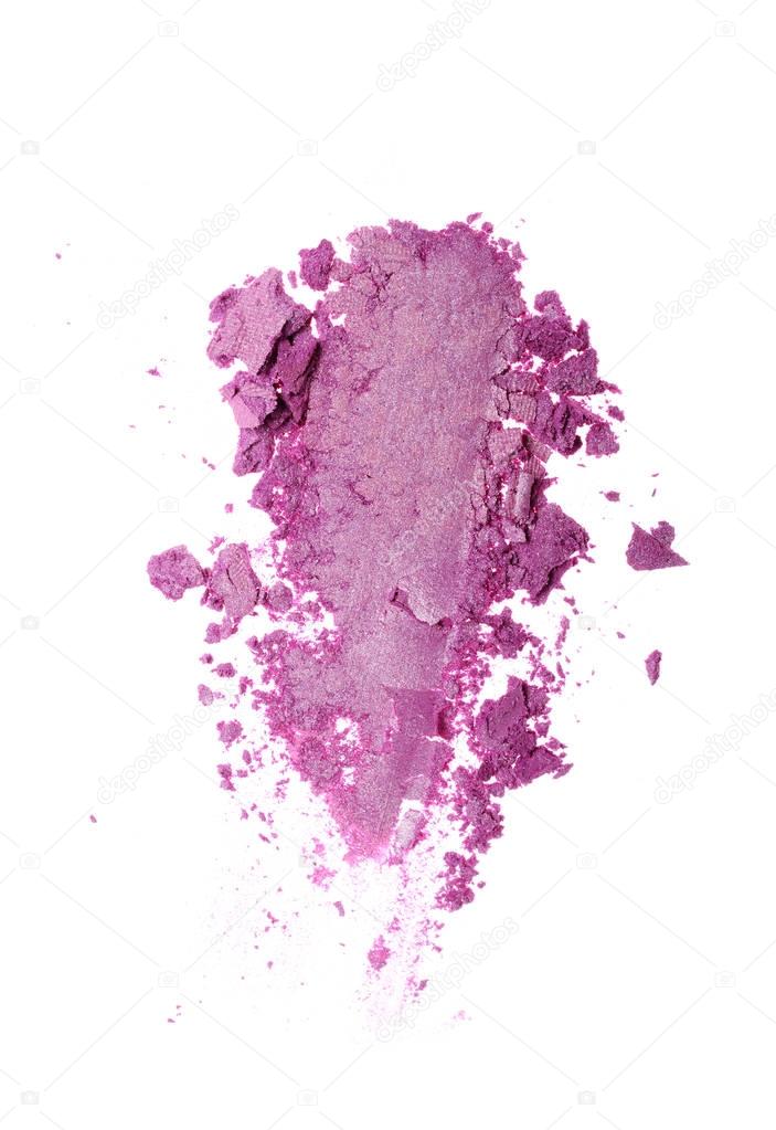 Smear of crushed shiny violet eyeshadow as sample of cosmetic product