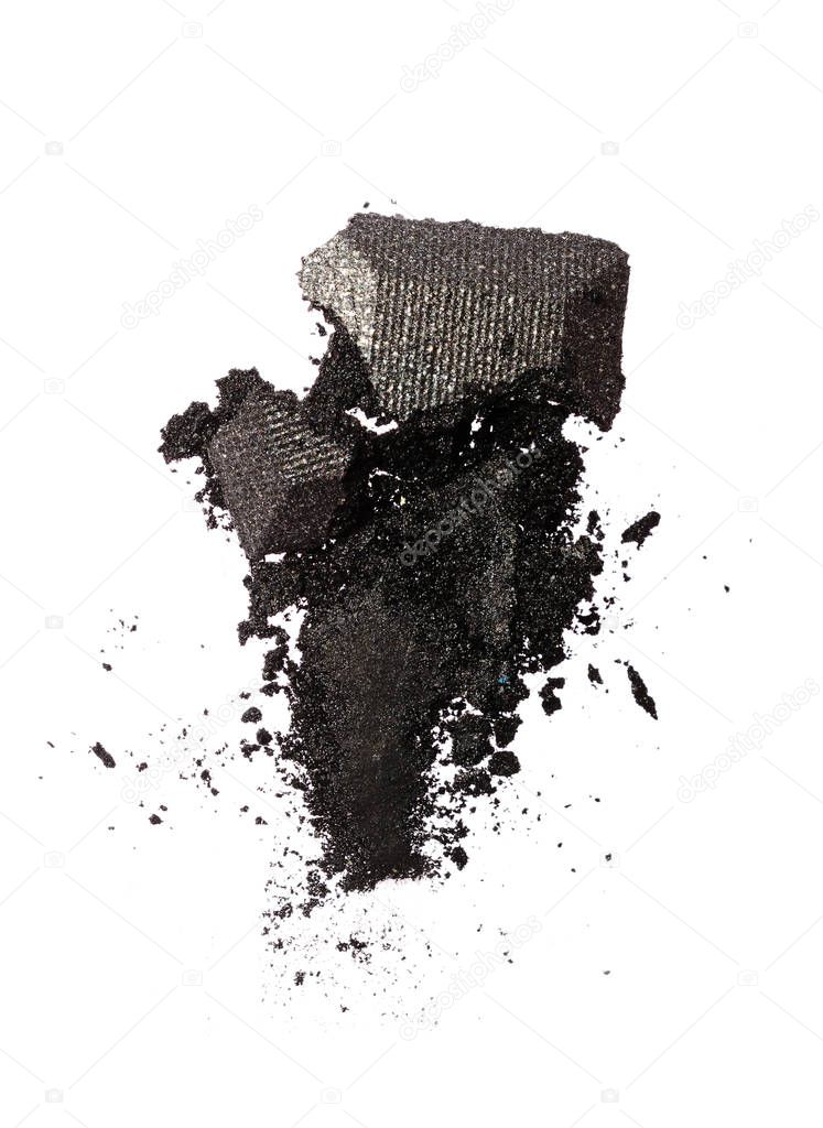 Smear of crushed shiny gray eyeshadow as sample of cosmetic product