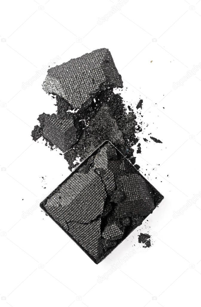 Crushed black eyeshadow as sample of cosmetic product