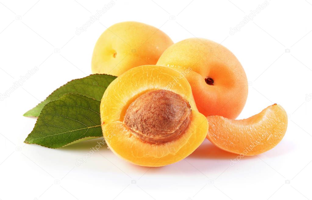 Ripe fruit for healthy life. Fresh apricot with green leaves