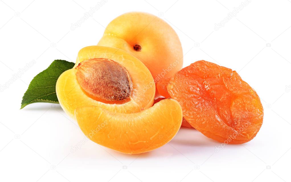 Ripe fruit for healthy life. Fresh and dried apricot with green leaf