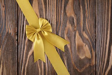 Golden ribbon with bow for decoration gift box