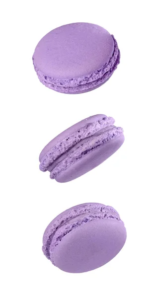 French dessert. Sweet lilac falling macaroons or macarons with lavender flavor — Stock Photo, Image