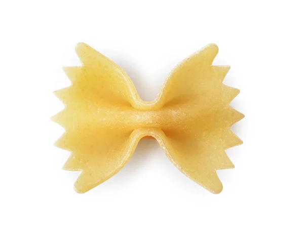 Close-up farfalle. Traditional shape of dry uncooked whole wheat Italian pasta — Stock Photo, Image