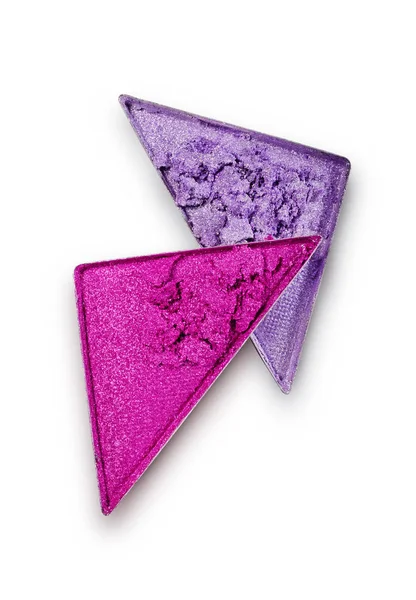 Ombretto a triangolo schiacciato viola e rosa per un trucco brillante come campione di prodotto cosmetico — Foto Stock
