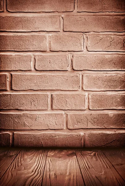 Brązowy streszczenie teksturowanej ceglane ściany i drewniane podłogi — Zdjęcie stockowe