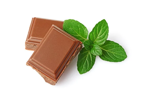 Close-up pieces of milk chocolate bar with mint — Stock Photo, Image