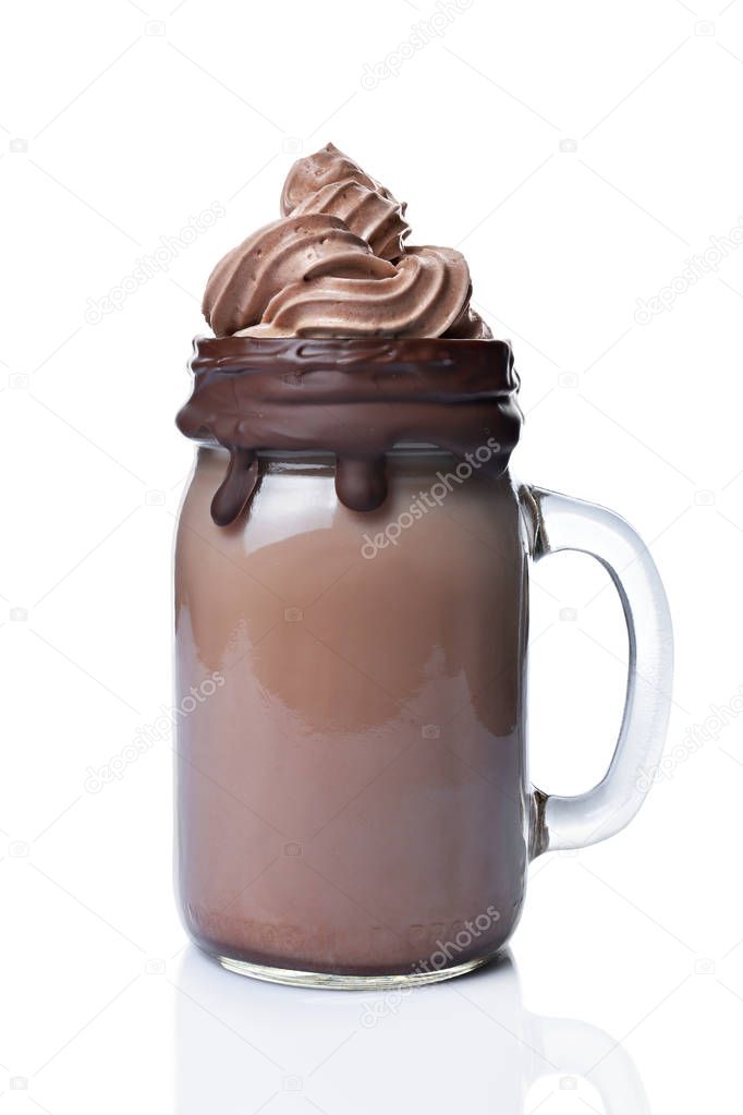 Crazy chocolate milk shake or mocha coffee with whipped cream in glass jar isolated on white background