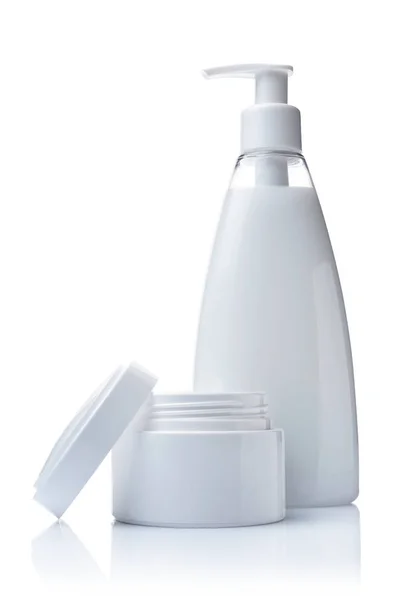 Frasco blanco en blanco y botella dispensadora de productos cosméticos — Foto de Stock