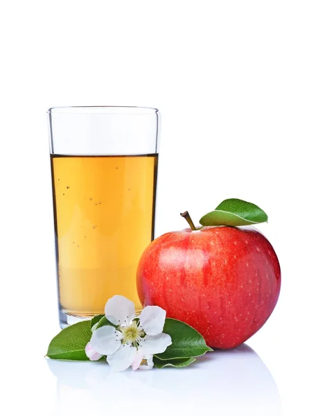 Glass of fresh organic juice and red apple with leaves and spring flowers — Stock Photo, Image