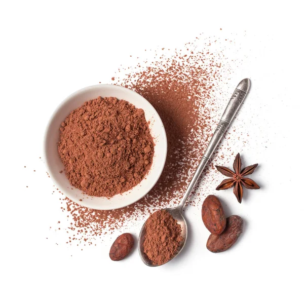 Cacao in polvere e fagioli in ciotola bianca con cucchiaio d'argento — Foto Stock
