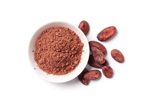 Cacao en polvo y frijoles en tazón blanco —  Fotos de Stock