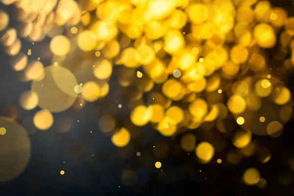 Fundo dourado abstrato com efeito bokeh — Fotografia de Stock