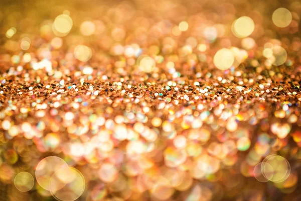 Abstrakter goldener Hintergrund mit Regenbogen-Bokeh — Stockfoto