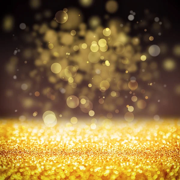 Abstrakter goldener Hintergrund mit Bokeh-Effekt — Stockfoto