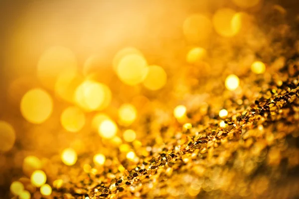 Abstract golden background with bokeh effect — Stock Photo, Image