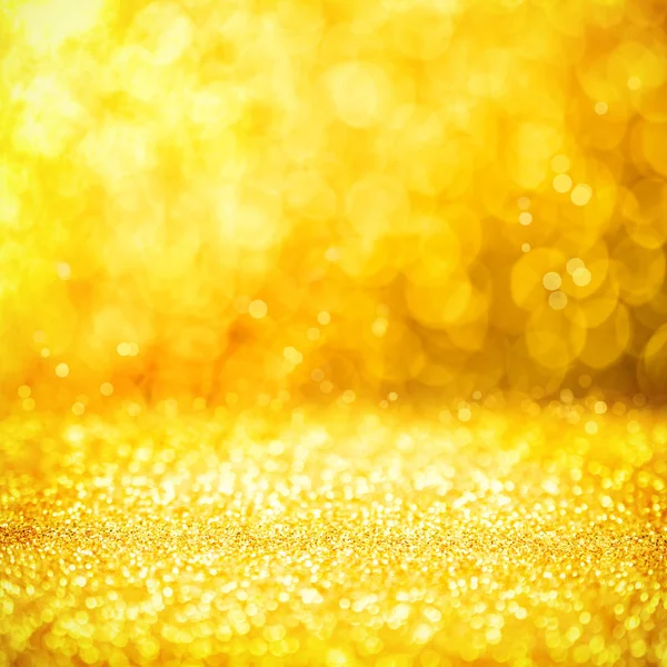 Fondo dorado abstracto con efecto bokeh —  Fotos de Stock