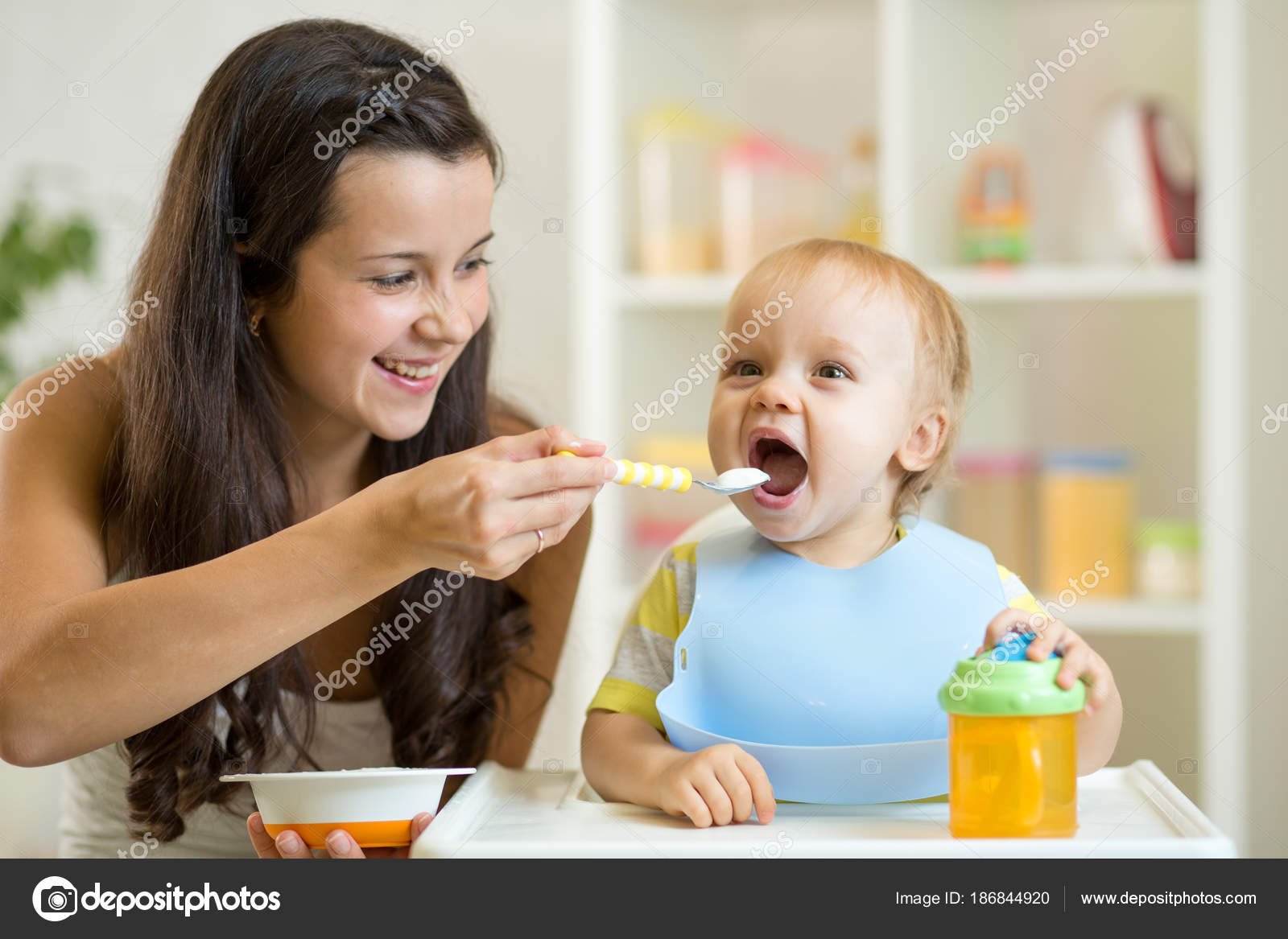 mother feeding her child