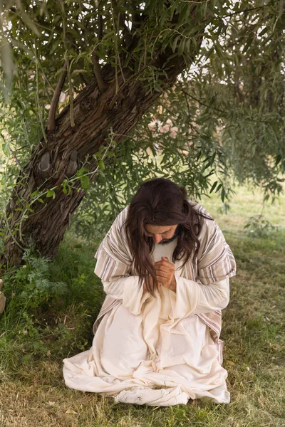 Jesus kneeling in agony at Gethsemane — Stock Photo, Image