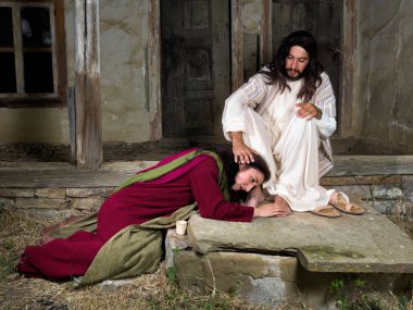 Mary Magdalene crying of shame and anointing Jesus' feet clipart