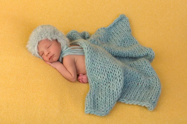 Newborn baby covered with blanket — Stock Photo, Image