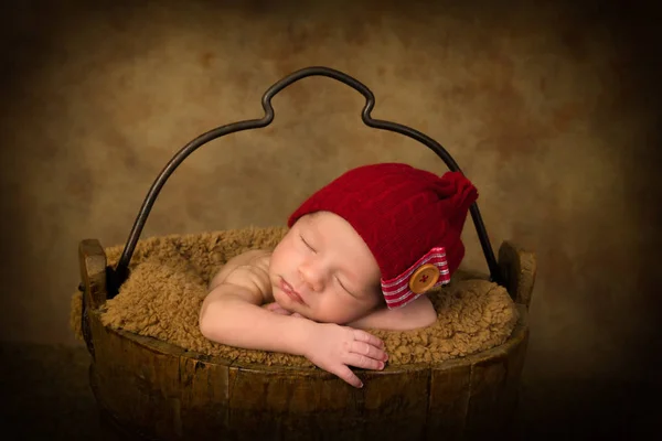 Baby in vintage bucket — Stock Photo, Image