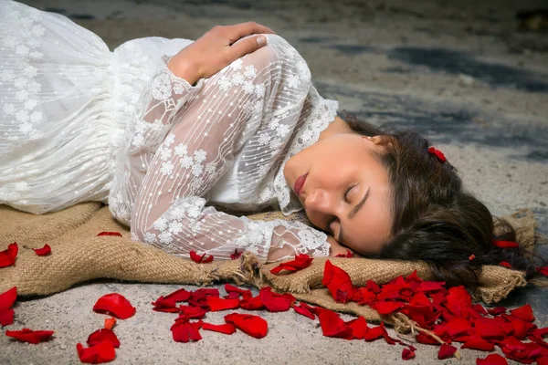 Beauty and rose petals — Stock Photo, Image