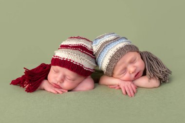Identical twins with hats clipart