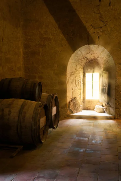 Wine barrels in French medieval castle — Stock Photo, Image