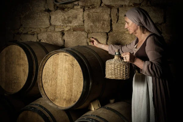 Woman Medieval Peasant Outfit Checking Wine Barrels Cellar Property Released — Stock Photo, Image