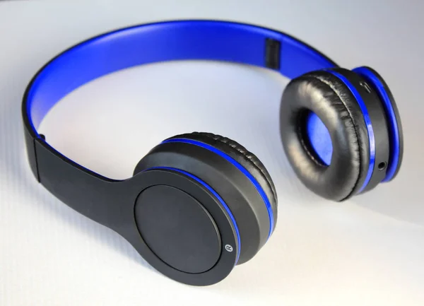 Stylish modern blue and black headphones on white background — 스톡 사진