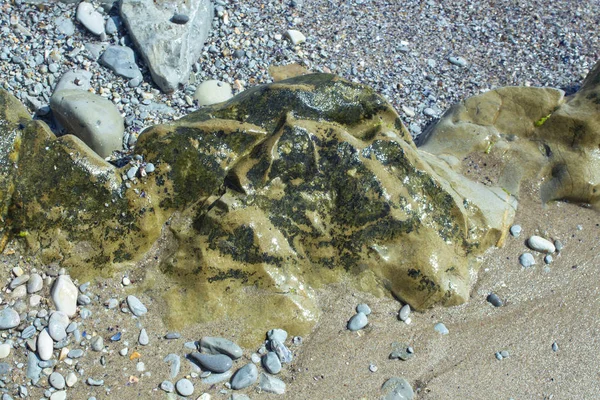 Series Photographs Ancient Stone Formations Colorful Rocky Stretch Sand Shore — стокове фото