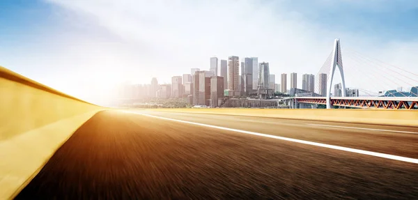 Motorway and modern city skyscrapers — Stock Photo, Image