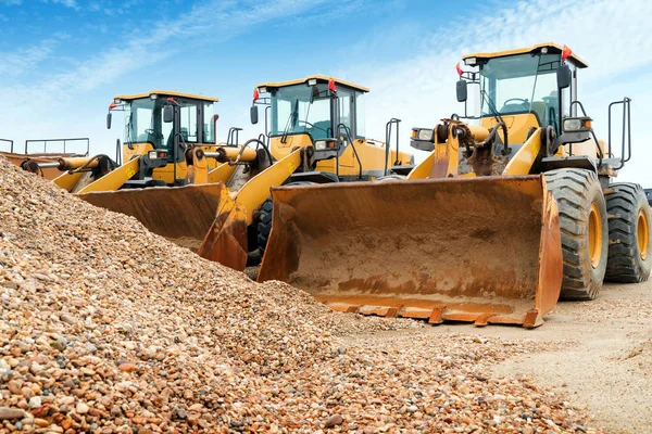 Neatly arranged excavators — Stock Photo, Image